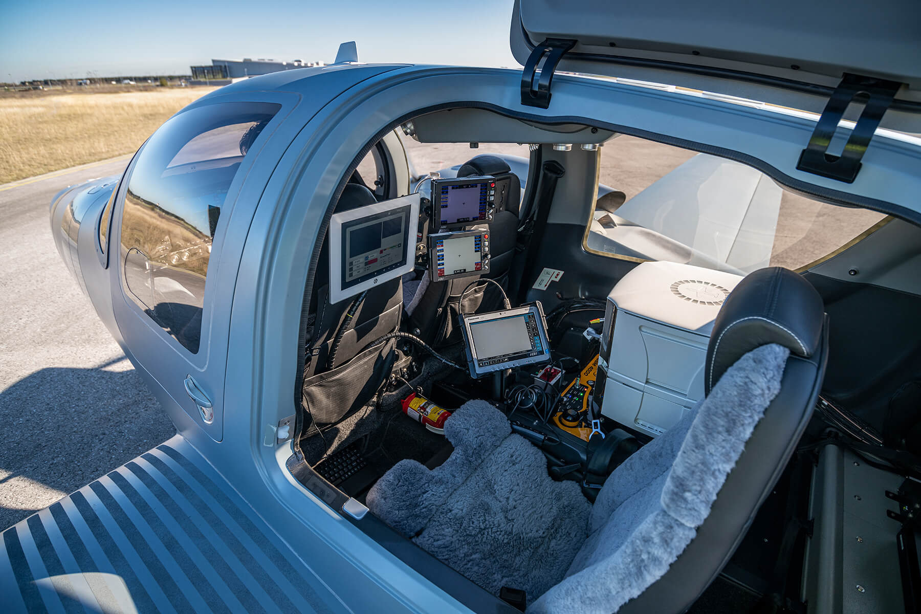 View into the DA62 MPP SurveyStar cabin with GSM 4000 gimbal, UltraCam aerial camera and related equipment